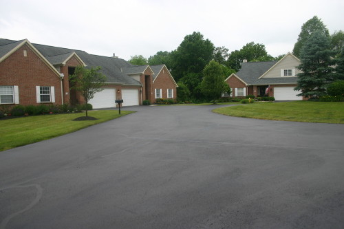 This is an asphalt re-sealcoating project in Blacklick Ohio at Hawks Crest Development after the project was completed.